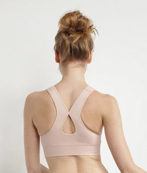 Seamless bra in almond pink Dim Sport