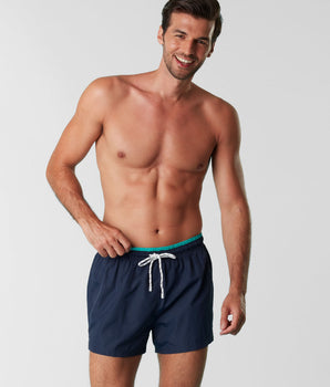 Navy blue swimming trunks in quick drying fabric