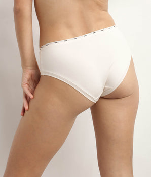 Women's stretch cotton briefs in Beige with a thin waistband Dim Icon Essentiel