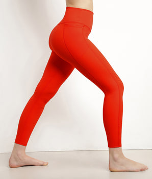 Women's sports leggings in orange sculpting microfibre Dim Move