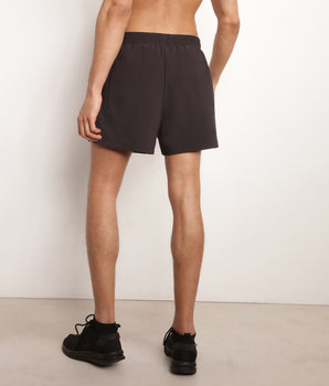 Short de sport homme en matière aérée Noir Dim Move